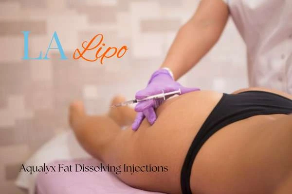 Woman having fat dissolving injections Glossop on thighs